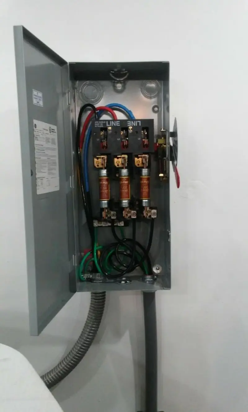 Three-phase disconnect switch installed for Smoke Detector Installation in Miami Springs